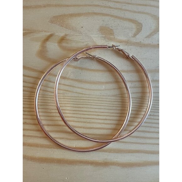Large Rose Gold-Tone Metal Hoop Earrings With Snap Closure - Picture 1 of 4